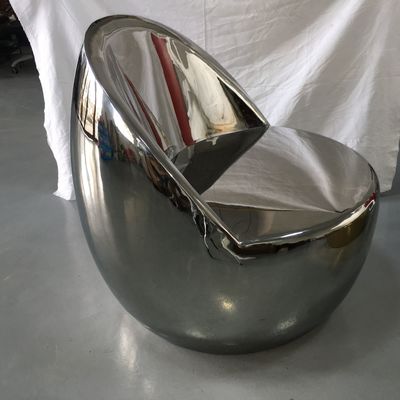 Stainless steel outdoor furniture a set of three stainless steel mirror stools and an electroplated coffee table