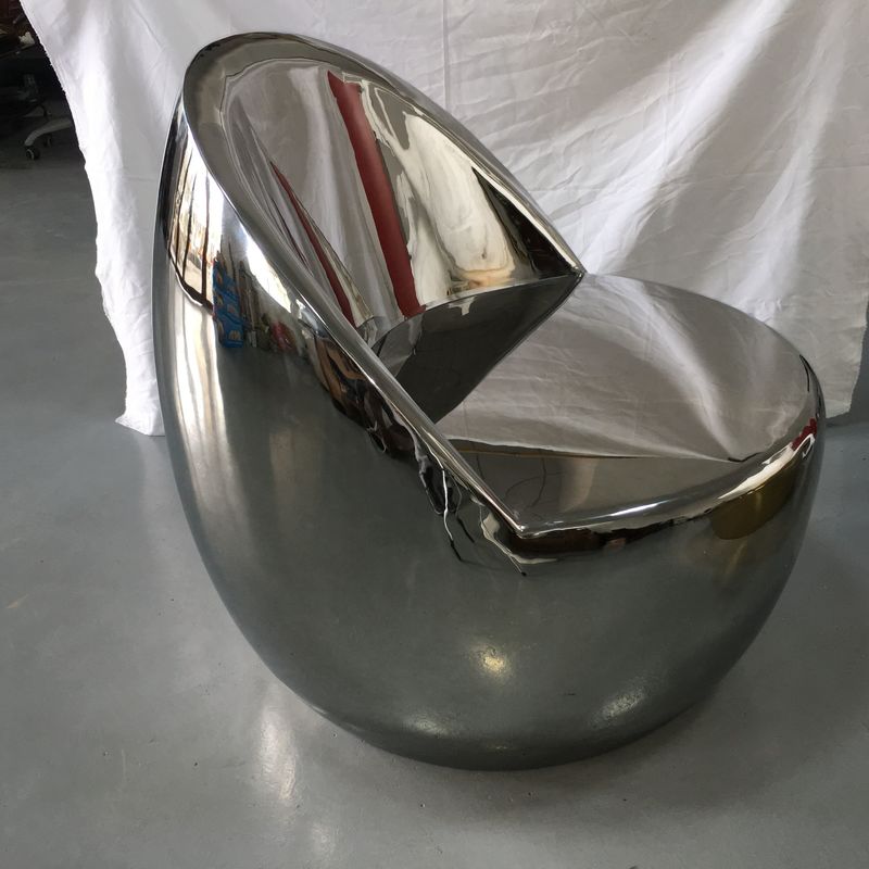 Stainless steel outdoor furniture a set of three stainless steel mirror stools and an electroplated coffee table
